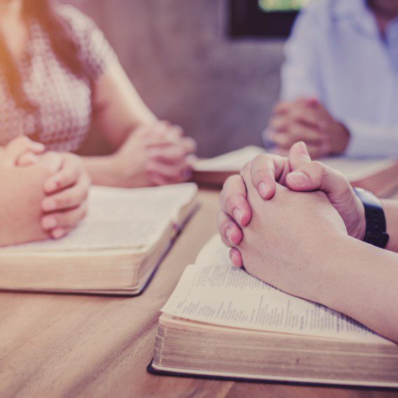 Small group praying